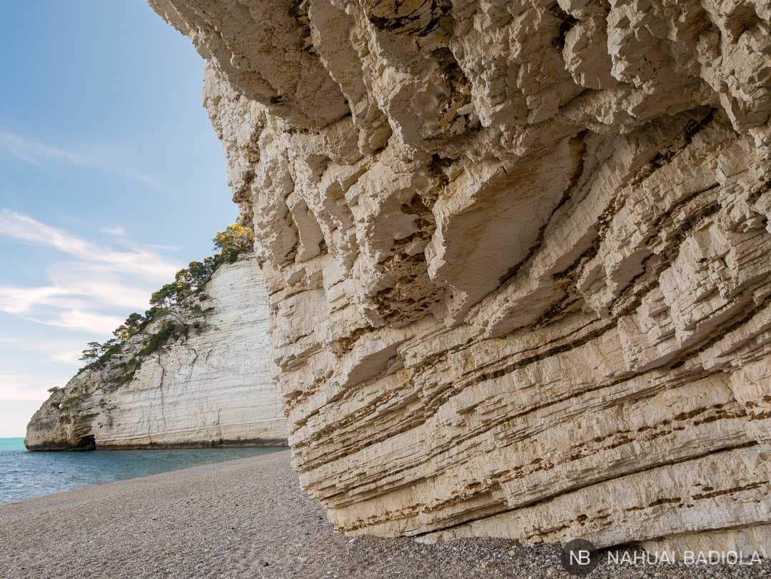 Under one of the caves on the cliff in Vignanotica, Italy.