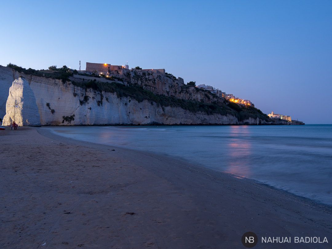 Views of Vieste and the Pizzomuno from the beach at sunset.