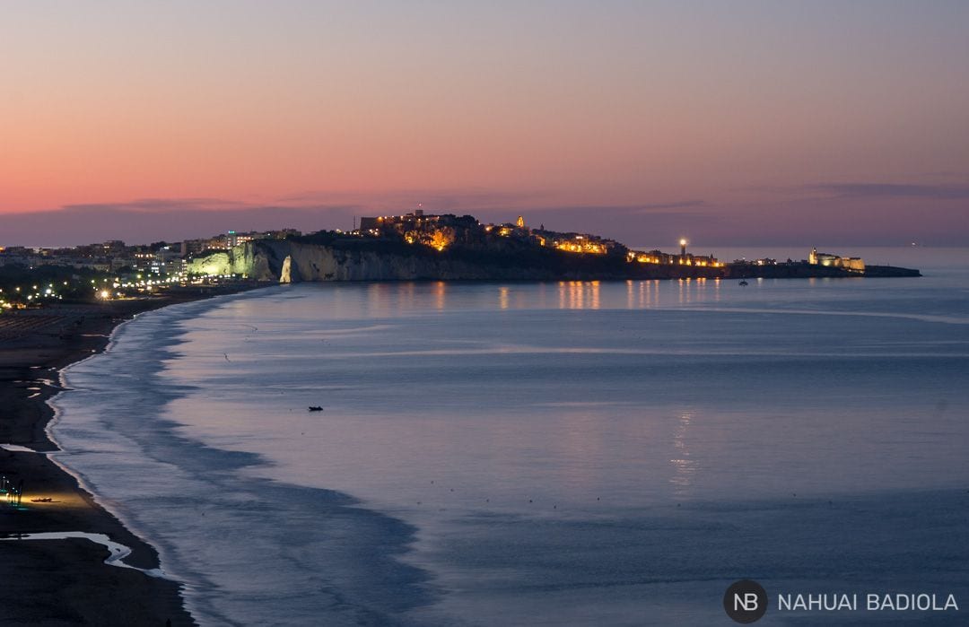 Profile view of Vieste at sunset from the viewpoint on the road.
